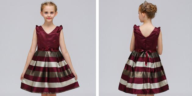 בשמלות של ילדים על לשקע: שמלת פסים עם חצאית